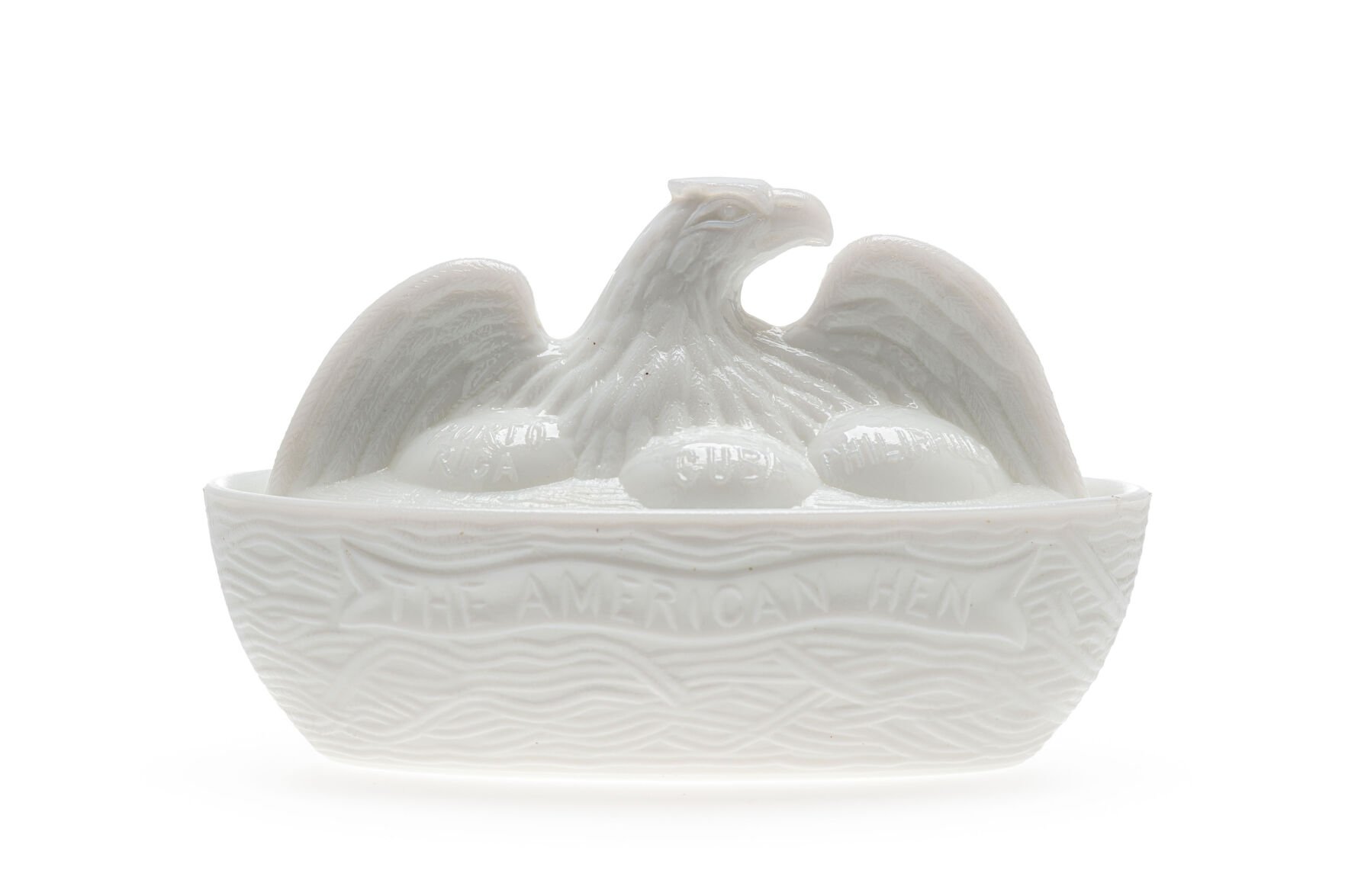 Propaganda in glass? This historic American eagle dish oversees its chicks, or its colonies